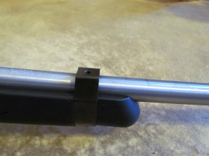 The new barrel band features a slightly raised flat top with threads cut to mount the front of the rail.